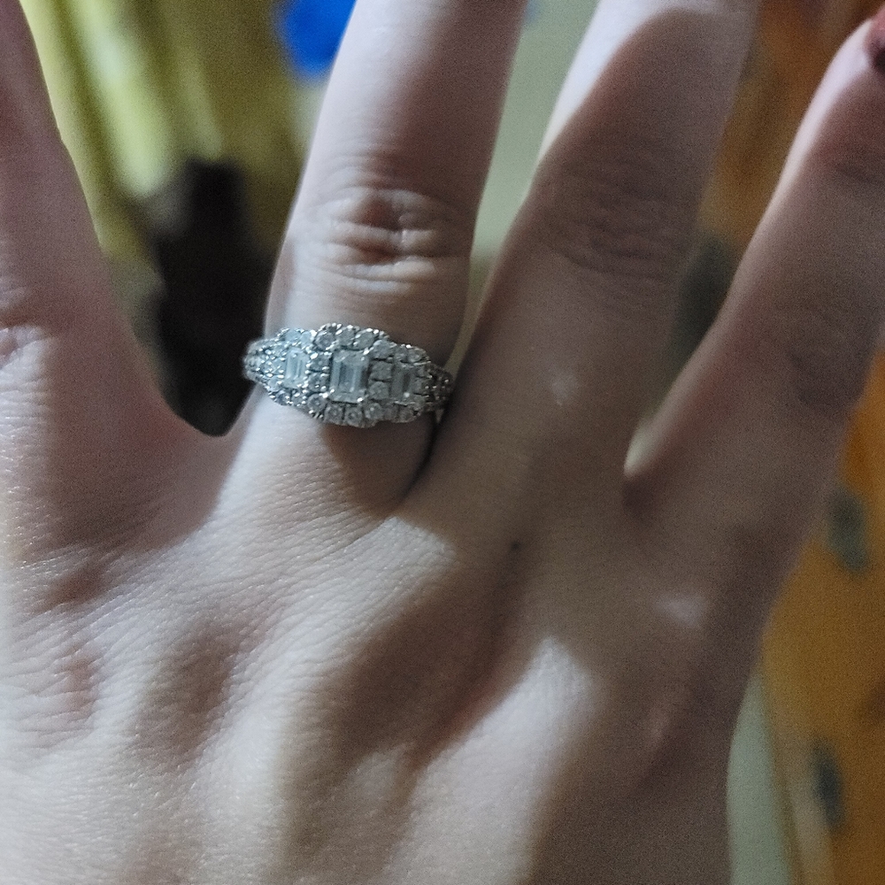 1 1/2 carat emerald cut past present future engagement ring